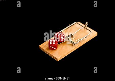 Dice on mouse trap Stock Photo