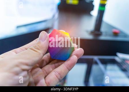 hand with Object printed on 3d printer close-up. Stock Photo