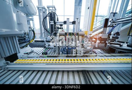 high performance automatic manufacturing assembly and inspection process at production line Stock Photo