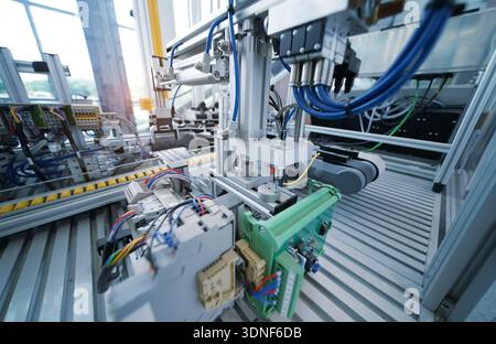 high performance automatic manufacturing assembly and inspection process at production line Stock Photo