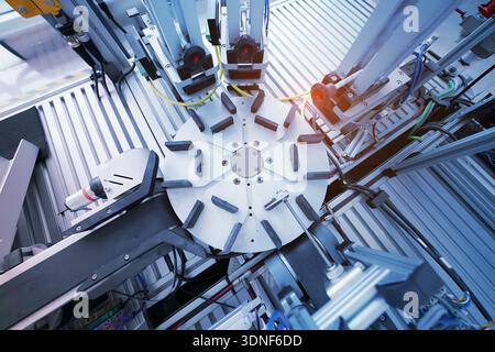 high performance automatic manufacturing assembly and inspection process at production line Stock Photo