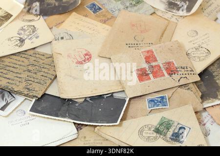 Postal letters in the envelopes with the stamp "Censorship looked" and photos from World War Two Stock Photo