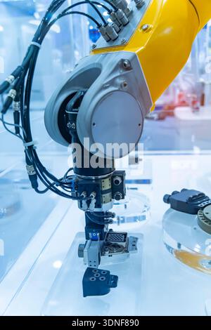 automatic gripping and smart robot working on smart factory,industry 4.0 and technology. Stock Photo