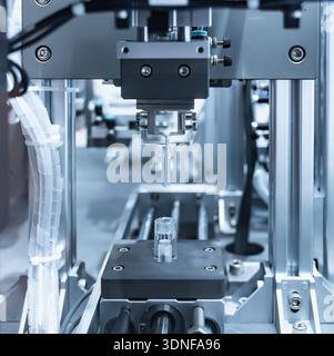 automatic gripping and smart robot working on smart factory,industry 4.0 and technology. Stock Photo