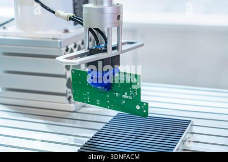automtic robotic arm system in intellegence pcb factory Stock Photo