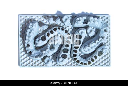Tooth dental crowns created on 3d printer for metal Stock Photo