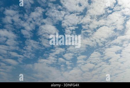 blue sky background with tiny clouds Stock Photo