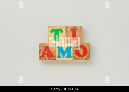 I Love You in Italian TI AMO, Spelled with Wooden Cubes Stock Photo