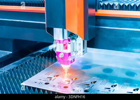 laser cutting machine controller in factory Stock Photo