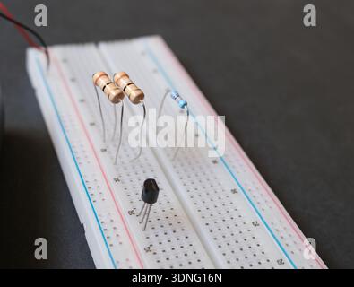 Resistors on the solderless breadboard. Electronic education or electrical experiments concept Stock Photo