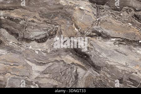Rich and intricate patterns adorn a natural stone surface, showcasing varying shades of gray, brown, and white. This artwork of nature evokes a sense Stock Photo