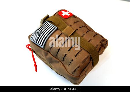 Close up of a military first aid kit on a white background. Stock Photo
