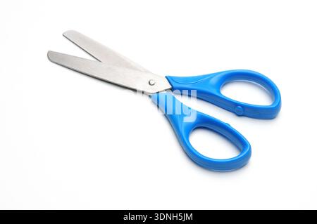 Blue baby scissors on an isolated white background/Blue baby scissors on an isolated white background Stock Photo
