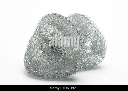 Metallic sponge for washing dishes and plumbing on isolated white background Stock Photo