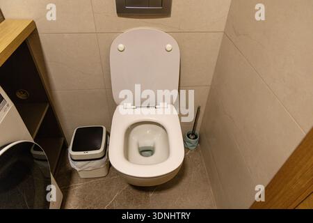 Modern White Toilet Bowl Bathroom Interior Stock Photo
