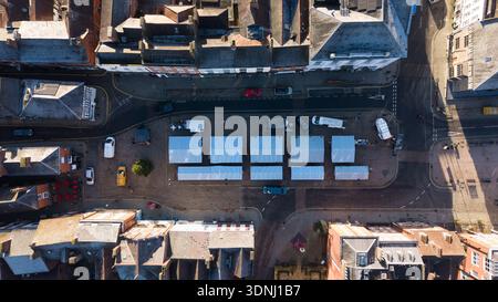 Aerial top down view of Ludlow market stalls being prepared in the morning, Shropshire Stock Photo