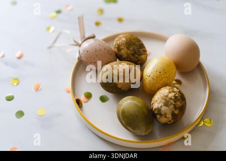 Minimalist Easter eggs dyed with natural colors. Happy Easter Day Stock Photo