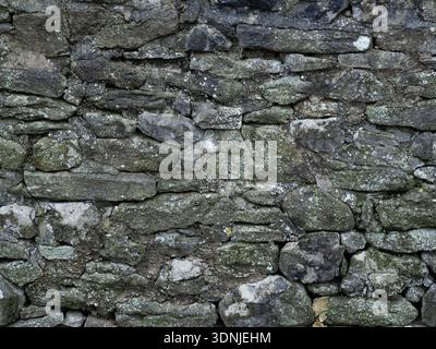 Weathered Grey Black Limestone Stone Wall Texture Background Stock Photo