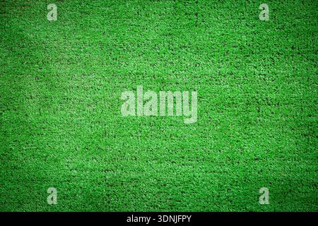 fresh artificial grass background or texture Stock Photo