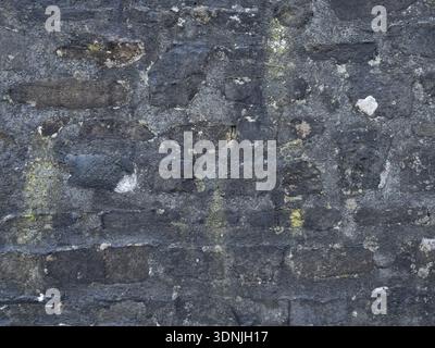Historic Limestone with Natural Black Staining Stock Photo