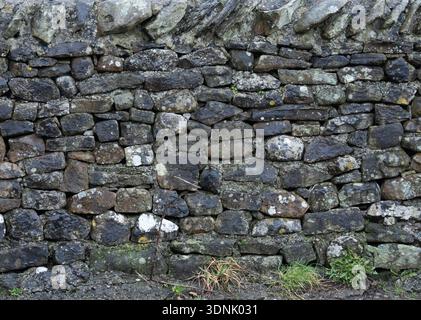 Weathered wall Background surface showing age texture Stock Photo