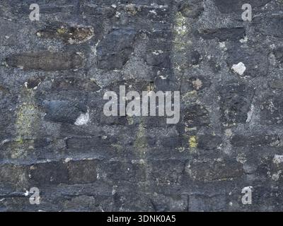 Historic Limestone with Natural Black Staining Stock Photo