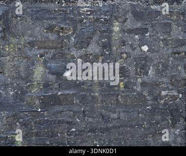 Historic Limestone with Natural Black Staining Stock Photo