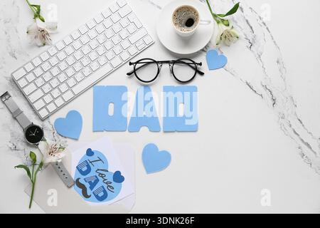Word DAD with postcard, keyboard and cup of coffee for Father's Day on white grunge background Stock Photo