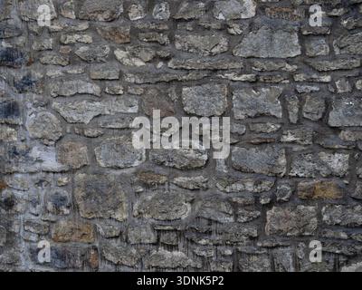 Moody Stone Facade Rough Texture Stock Photo