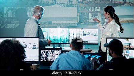 Back, CCTV and computer screen with people in control room to monitor live security footage. Conversation, display and surveillance with team in Stock Photo