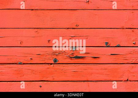 Peeling Red Paint on Weathered Wooden Planks Stock Photo