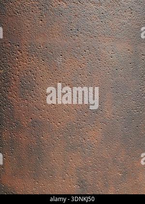 Rusty surface in brown tones with detailed texture. Abstract close-up. Copyspace. Stock Photo