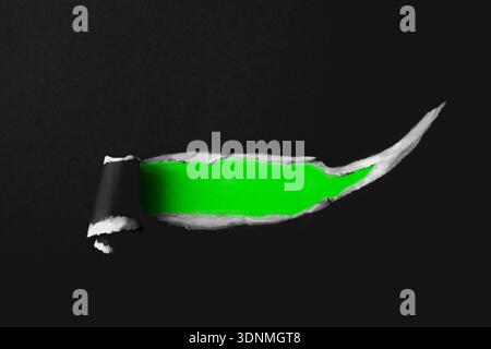 green and black paint strokes with a brush strokes on a black background Stock Photo