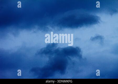 The view of the sky is cloudy, then overcast and dark before rain or a storm comes. Stock Photo