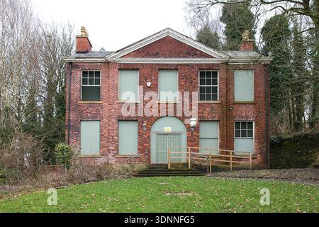 Abandoned Rock Hall with Boarded Up Windows, Moses Gate Country Park, Bolton, UK Stock Photo