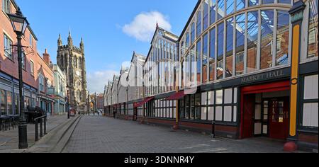 Stockport Market Place with Market Hall entrance and St Mary’s church tower under a bright blue winter sky, Stockport, Greater Manchester. Stock Photo