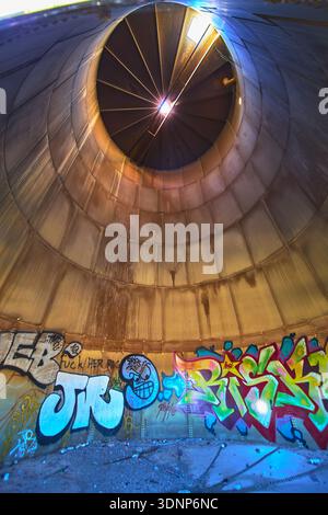 Abandoned Water Park Graffiti Interior Circular Metal Structure and Sunlight California Stock Photo