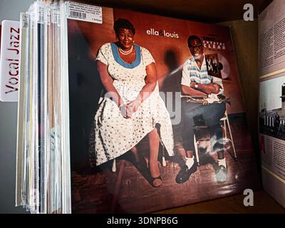 Lviv, Ukraine - February 07, 2026: Vintage vinyl album 1956 cover featuring Ella Fitzgerald and Louis Armstrong seated, a jazz duo portrait. Stock Photo