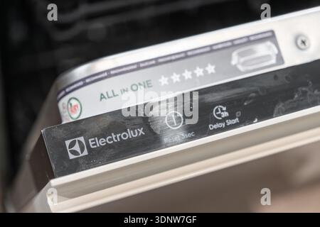 Krakow, Poland - November 30, 2025: Close-up of an Electrolux dishwasher's sleek control panel, displaying essential settings for convenient and moder Stock Photo