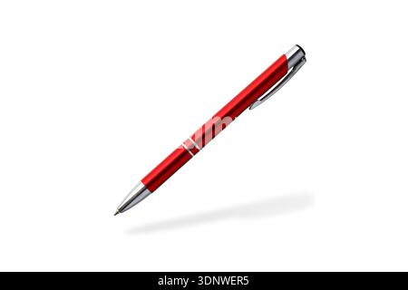 Red pen flying isolated on white background. Metallic ball pen with shadow Stock Photo