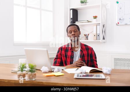 Young black man enjoying his successful business Stock Photo