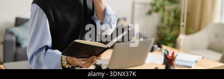 A young man enjoys a moment of inspiration in his stylish apartment. Stock Photo