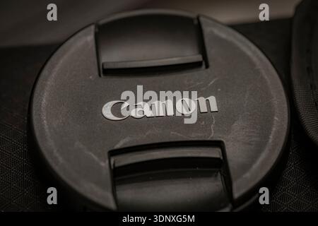 Close-up view of Sigma camera lens showing logo, focal length markings, and textured zoom ring in black and white Stock Photo