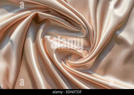 This image showcases a luxurious silk fabric with a soft velour texture, gracefully draped to highlight its smooth surface and shimmering glow, creati Stock Photo