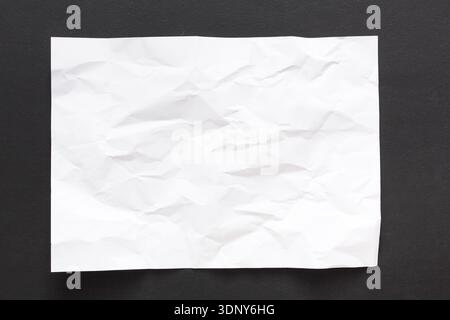 Crumpled white paper background Stock Photo