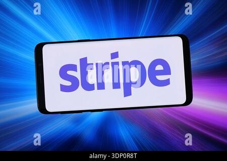 Stuttgart, Germany - 02-04-2026: In this photo illustration, the logo of financial services company Stripe Inc. is displayed on a smartphone. Stock Photo