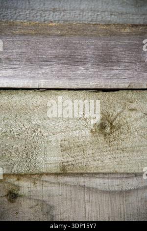 Vertical gray wooden planks texture with knots Stock Photo