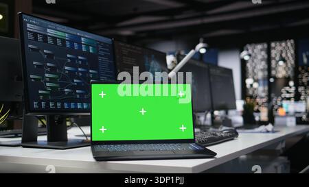 Isolated screen laptop in empty Silicon Valley company office used for developing apps. Mockup notebook using deep learning tech in workplace to debug applications and resolve issues Stock Photo