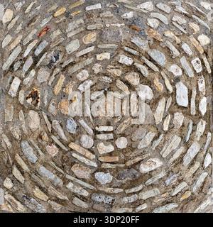 A detailed, top-down view of a historic stone pavement featuring a stunning concentric circular pattern, ideal for use as an abstract background, text Stock Photo