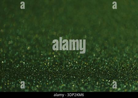 Green glitter texture holidays background. Macro shot Stock Photo